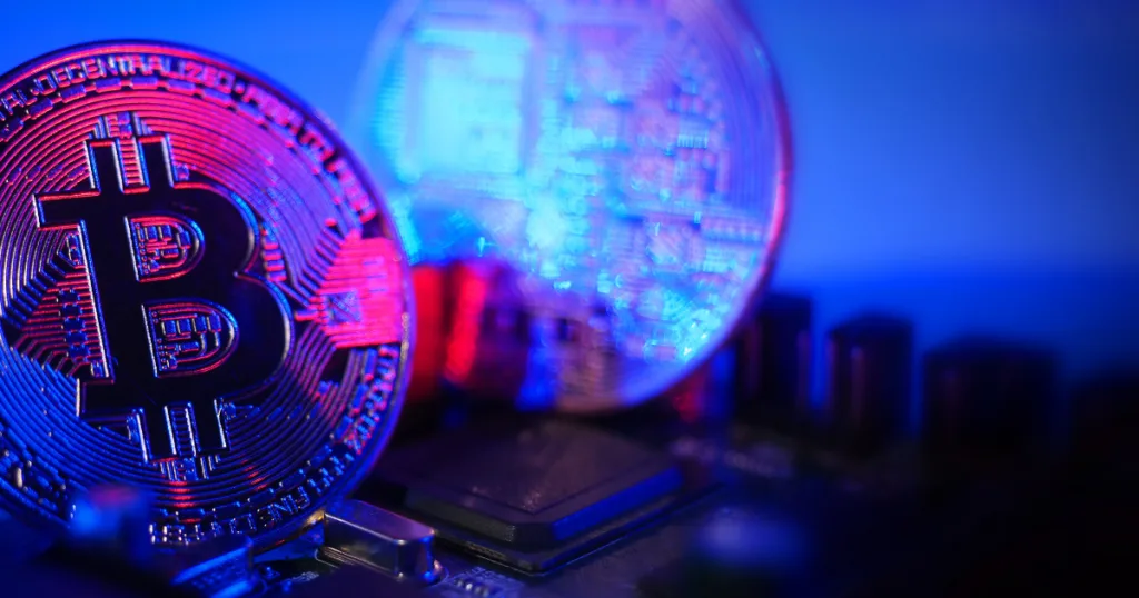 Bitcoin coins on circuit board glowing in neon, symbolizing Canada MSB and 加密卡